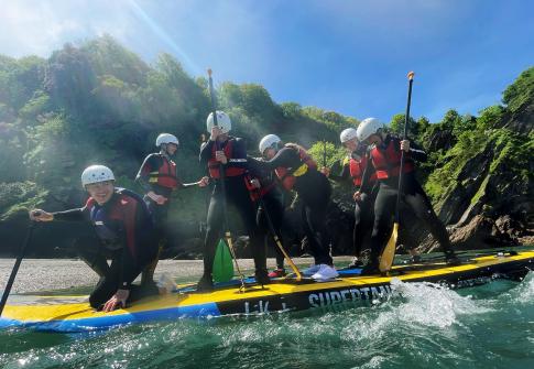 paddleboarding on the giant SUPs