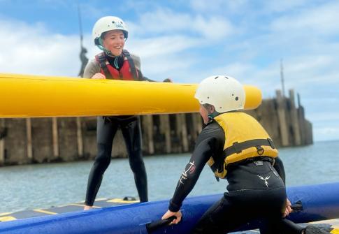 giant paddleboards, scout camp activities, last man standing