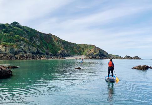 paddleboarding in the sea around woolacombe